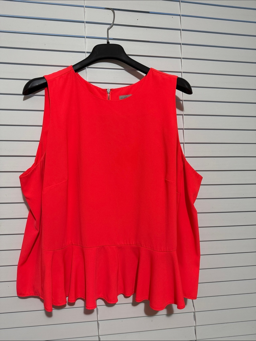 Sleeveless Peplum Top in Bright Red